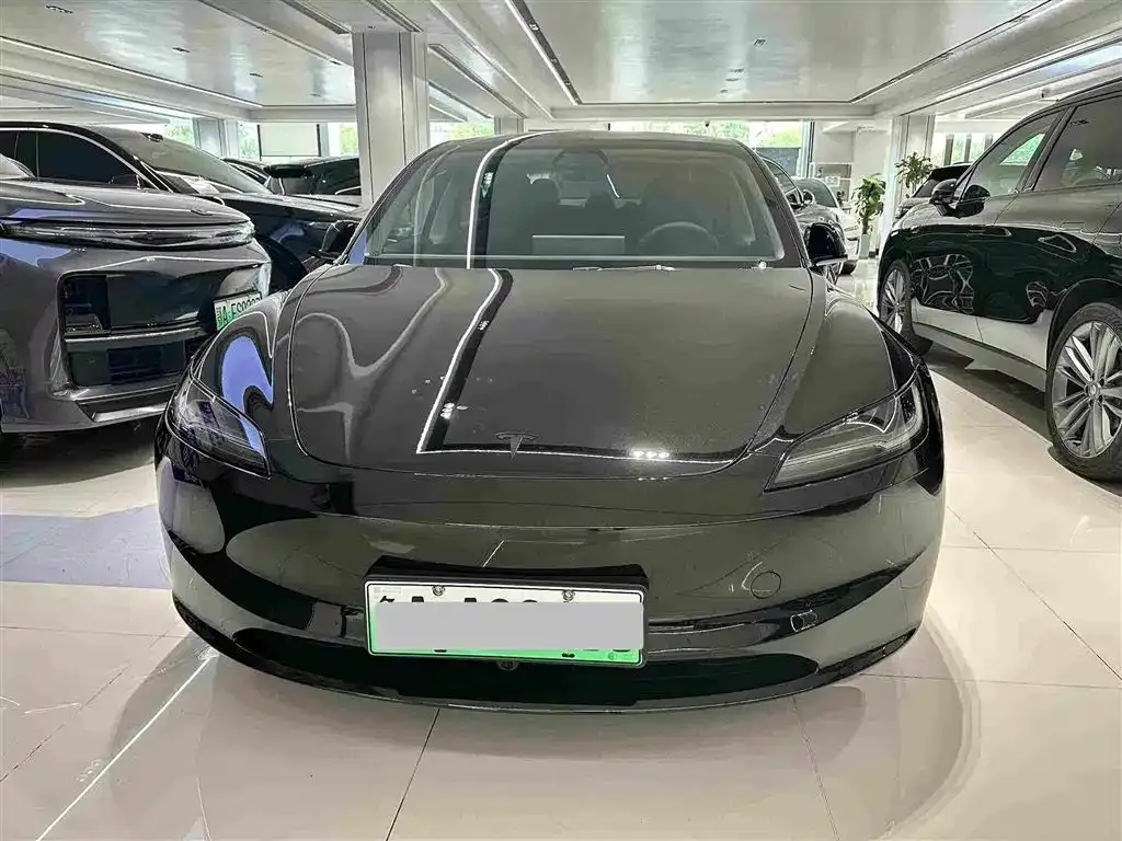 Tesla Model 3 — фото 7