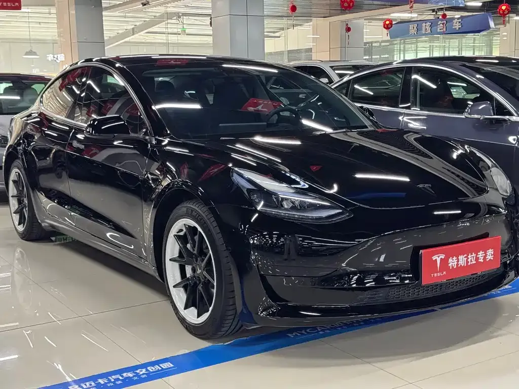 Tesla Model 3 — фото 9