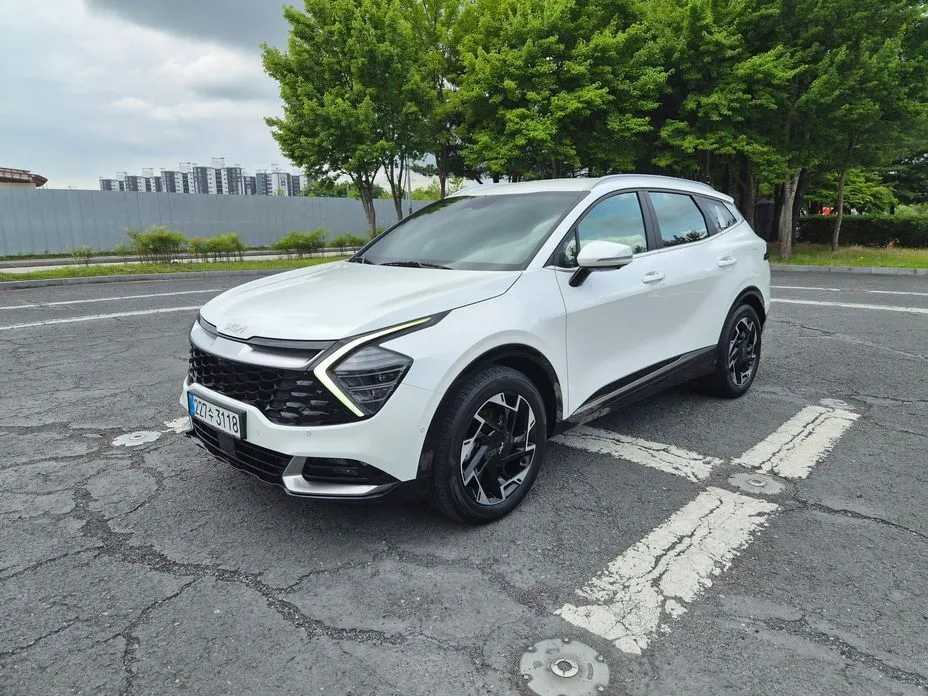 Kia Sportage — фото 8