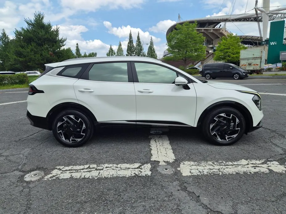 Kia Sportage — фото 9