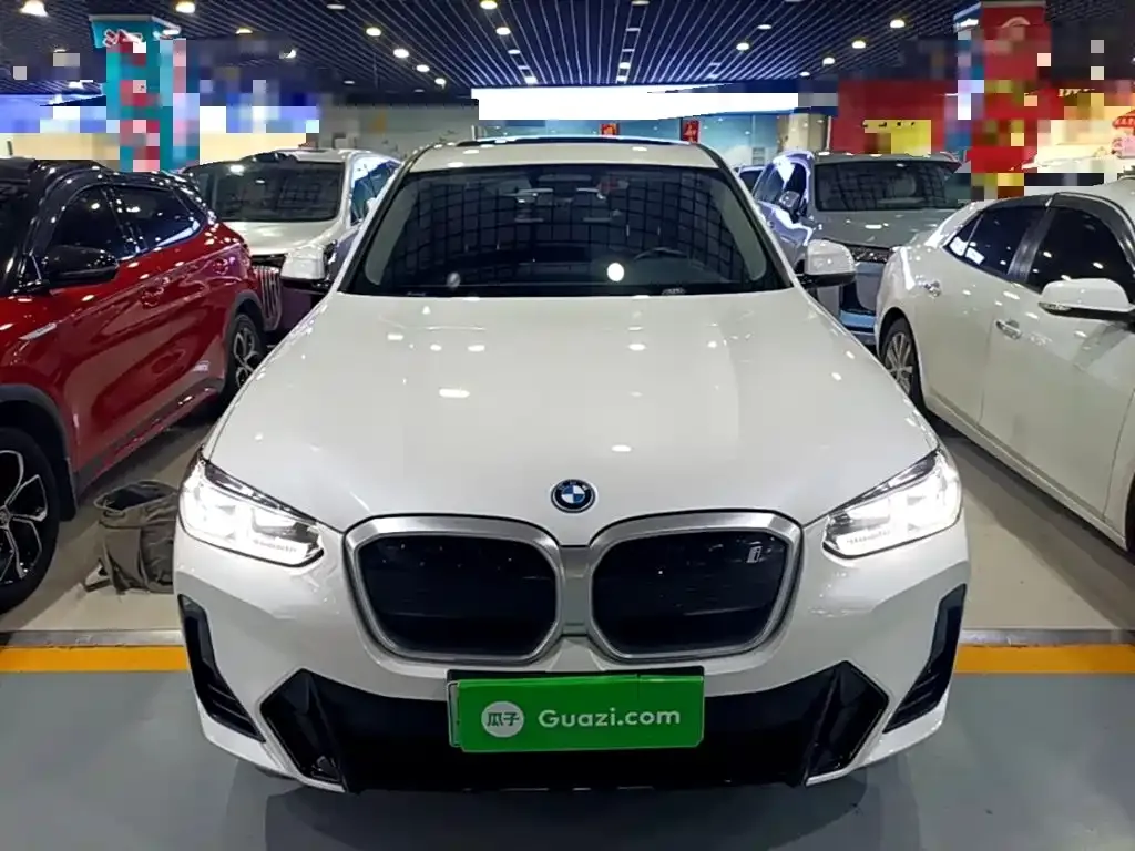 BMW iX3 — фото 10