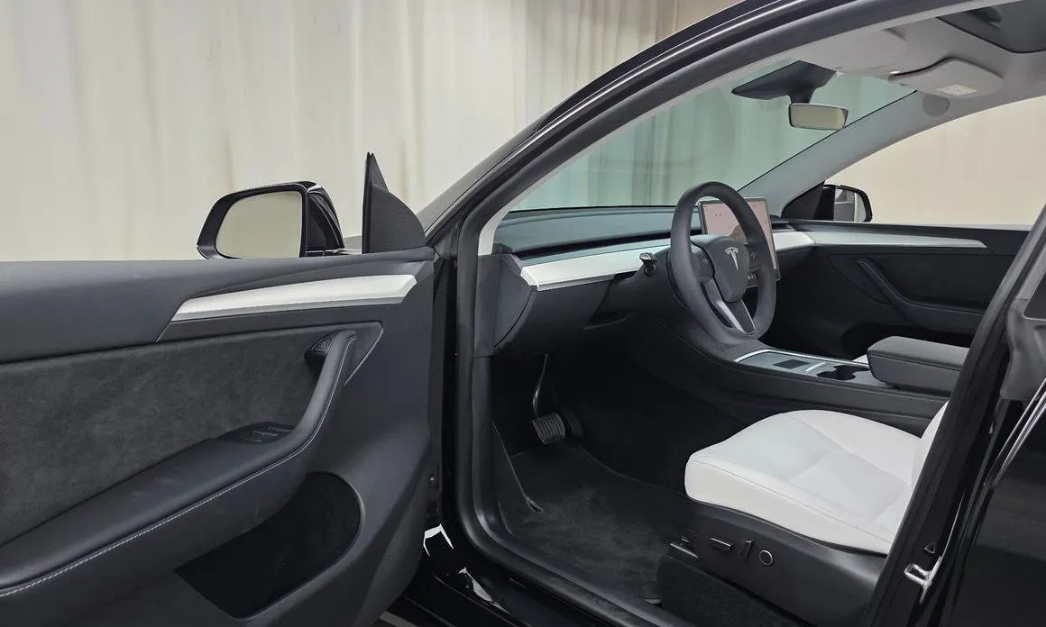 Tesla Model Y — фото 7