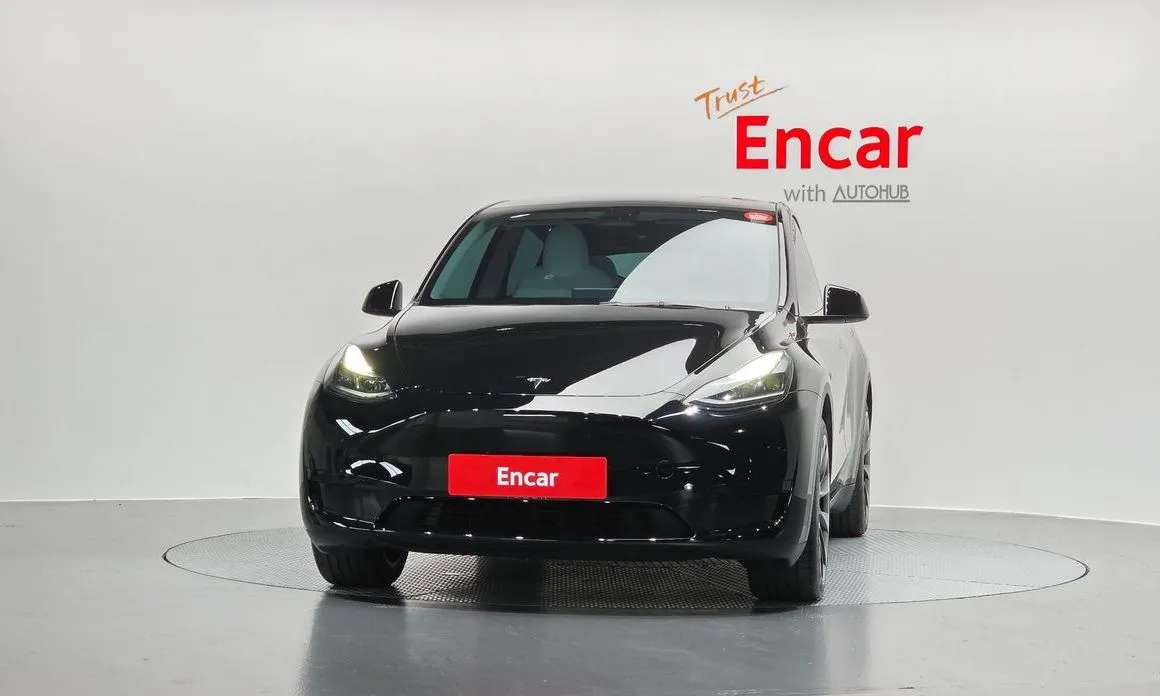 Tesla Model Y — фото 9
