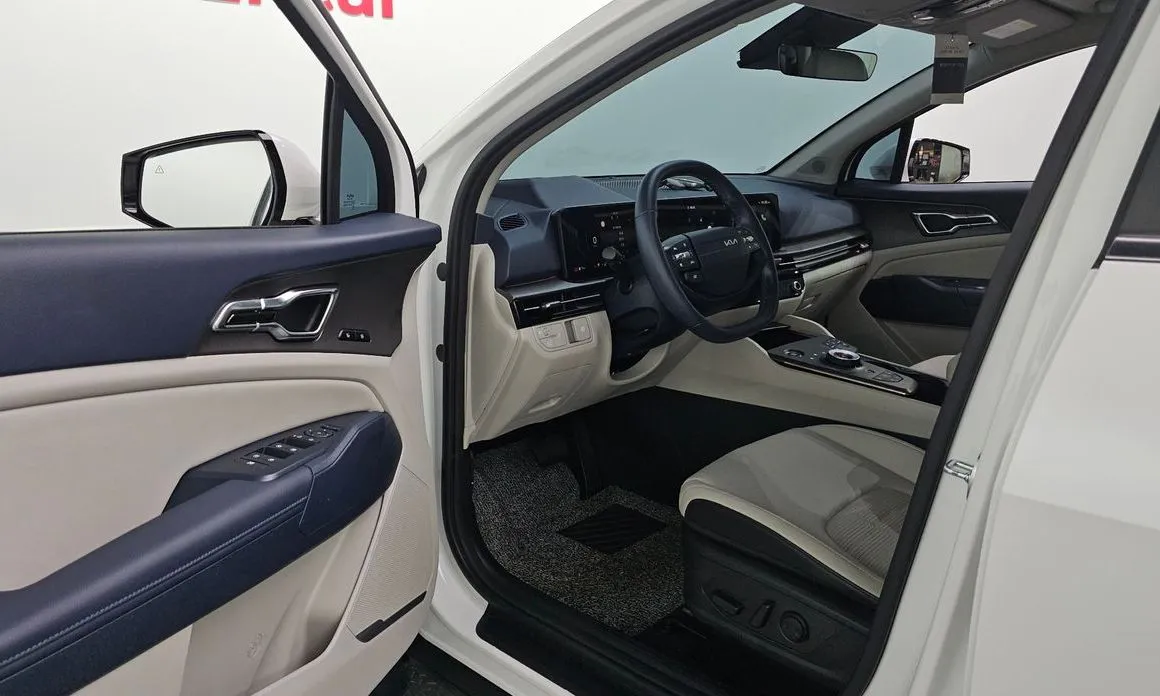 Kia Sportage — фото 10