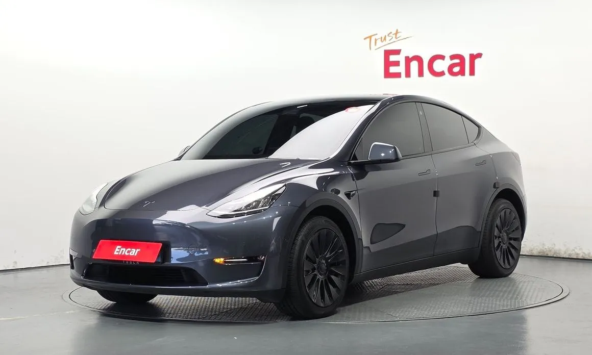 Tesla Model Y — фото 1