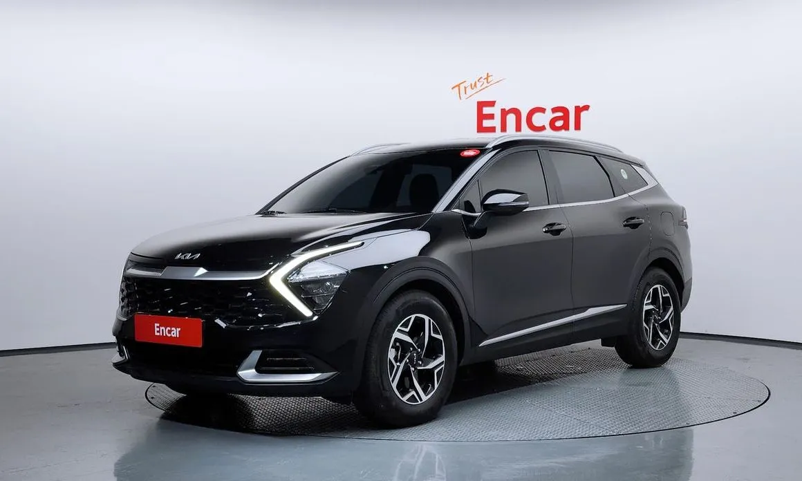 Kia Sportage — фото 1