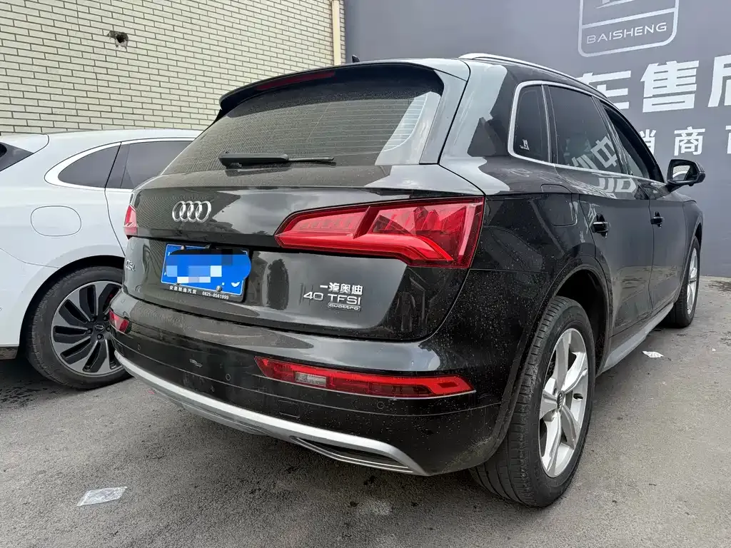 Audi Q5L — фото 7