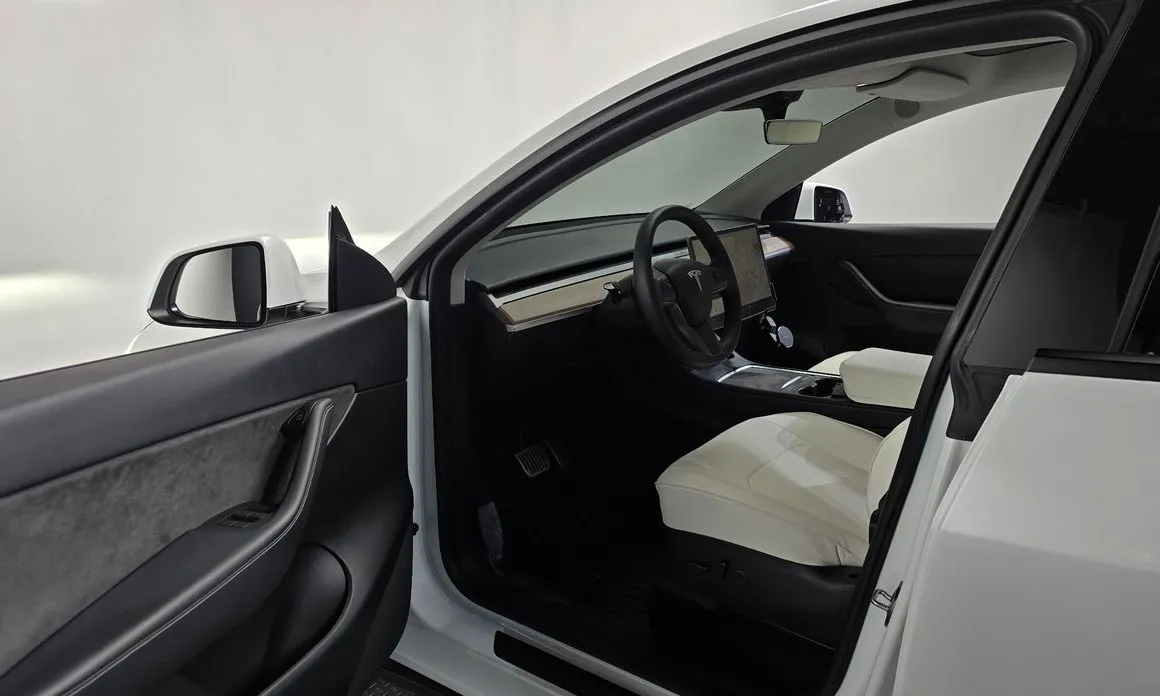 Tesla Model Y — фото 6
