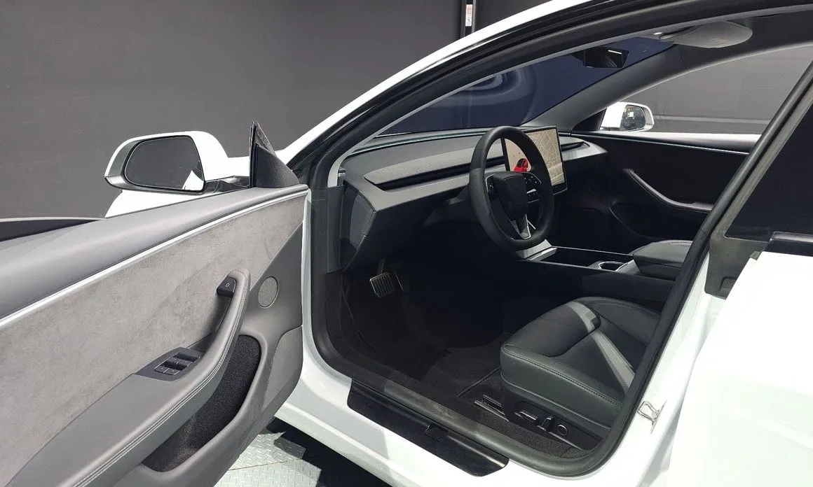 Tesla Model 3 — фото 10