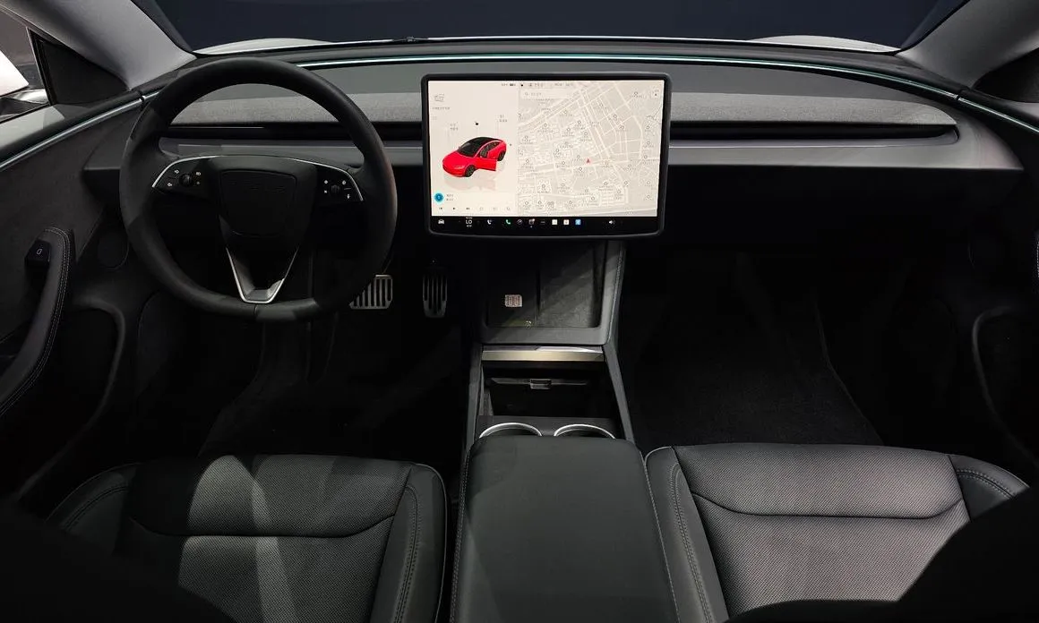 Tesla Model 3 — фото 9
