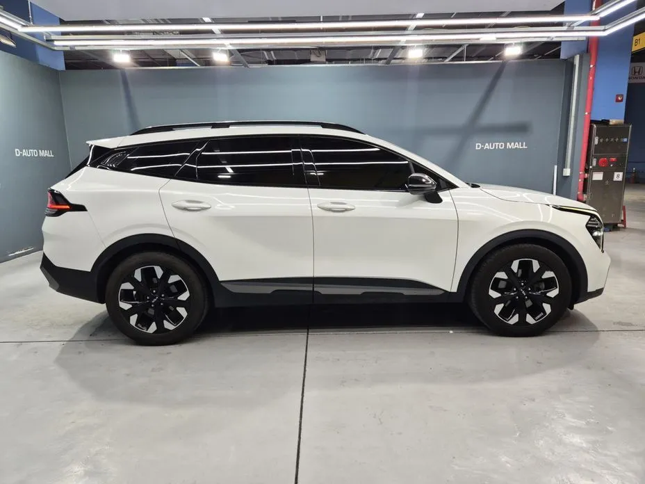 Kia Sportage — фото 10