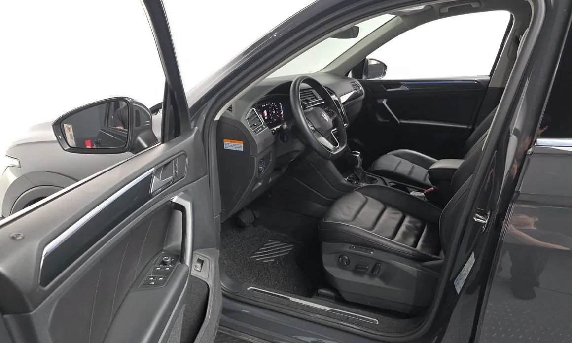 Volkswagen Tiguan — фото 10