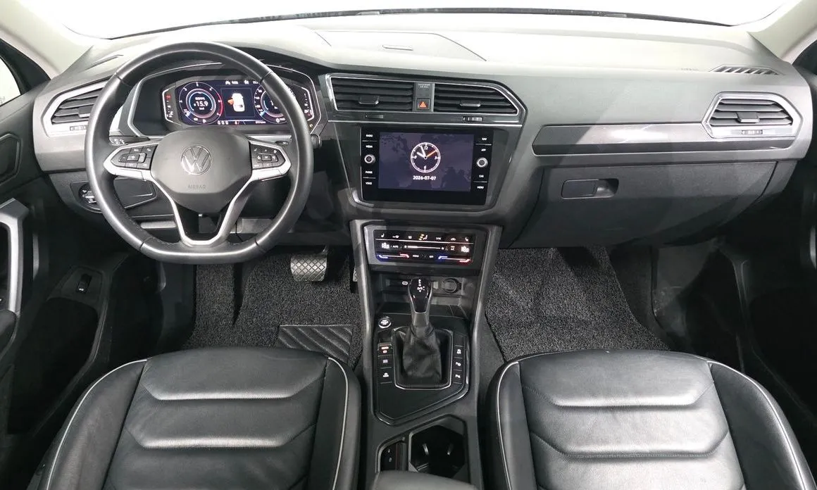 Volkswagen Tiguan — фото 7