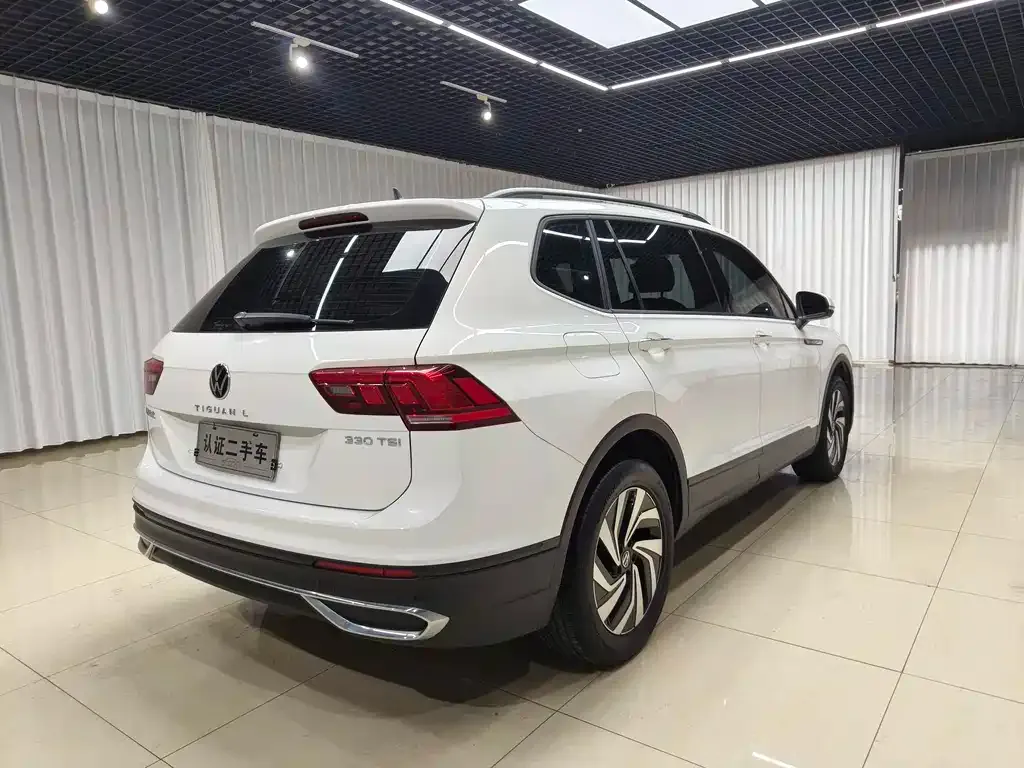 Volkswagen Tiguan L — фото 4
