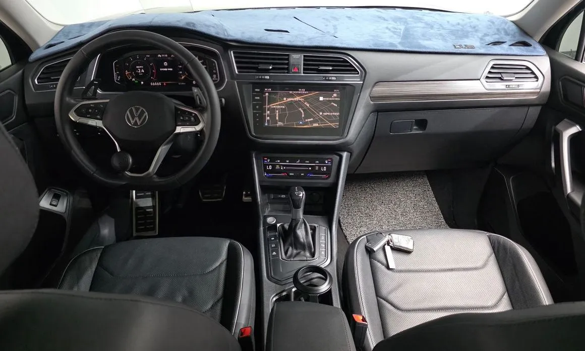 Volkswagen Tiguan — фото 10
