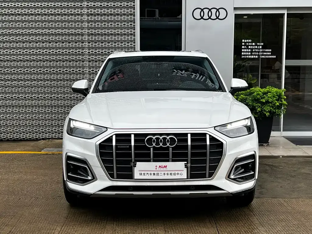 Audi Q5L — фото 6