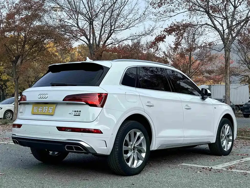 Audi Q5L — фото 9