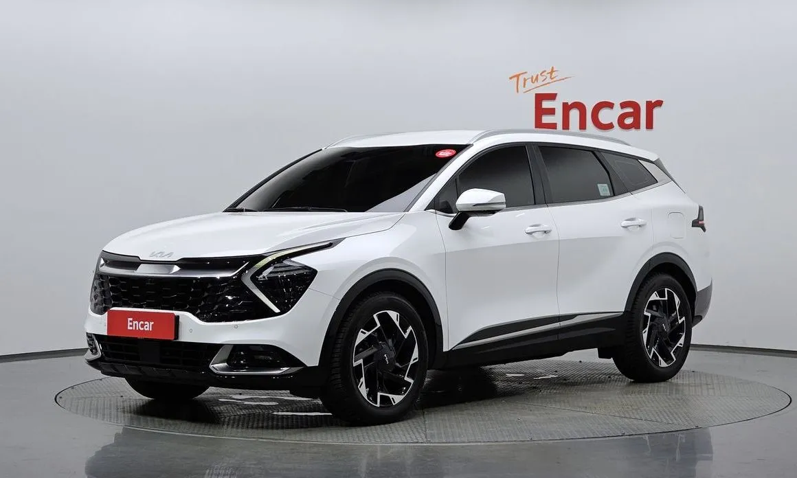 Kia Sportage — фото 1