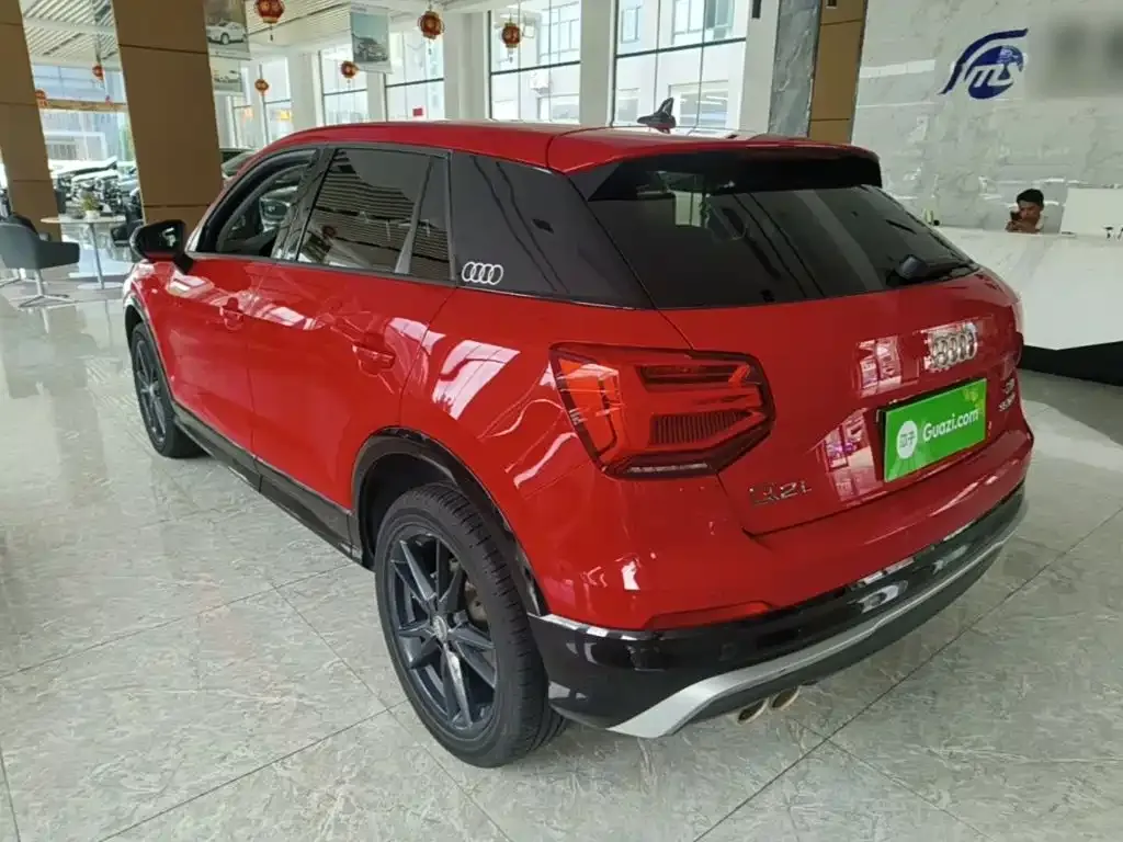 Audi Q2L — фото 10