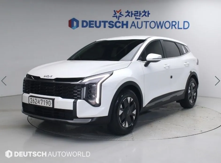 Kia Sportage — фото 1