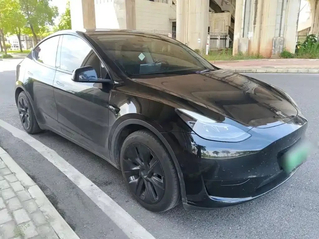 Tesla Model Y — фото 7