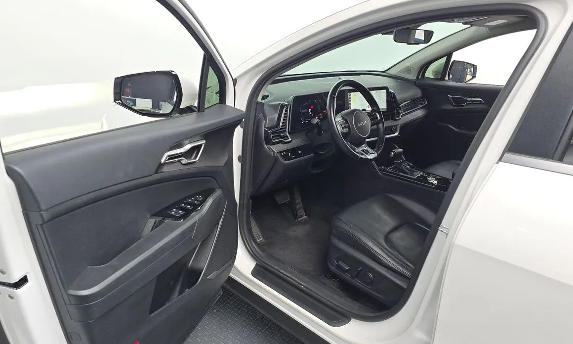 Kia Sportage — фото 10