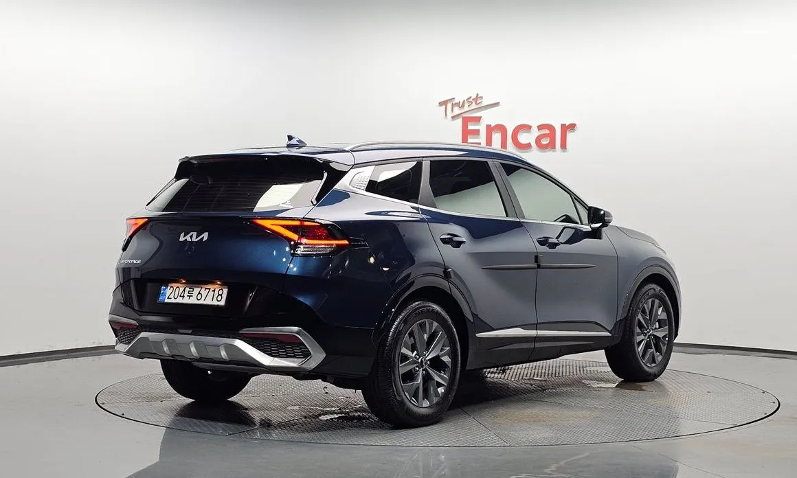 Kia Sportage — фото 8