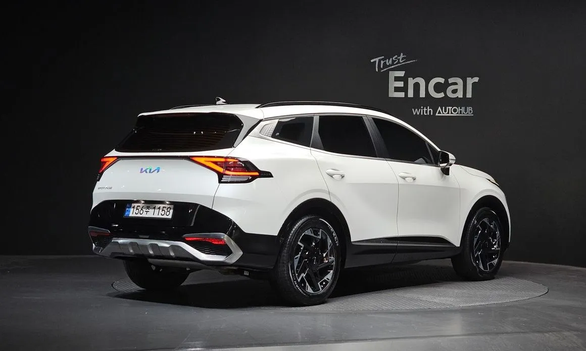 Kia Sportage — фото 10