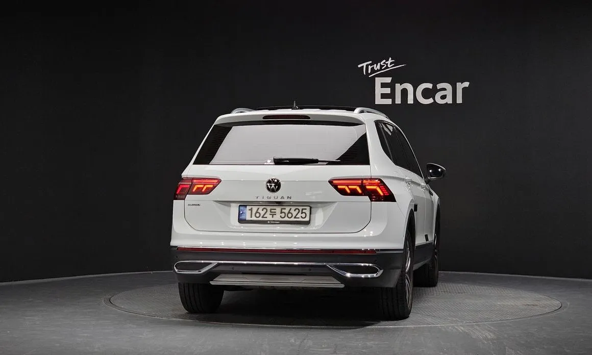 Volkswagen Tiguan — фото 6