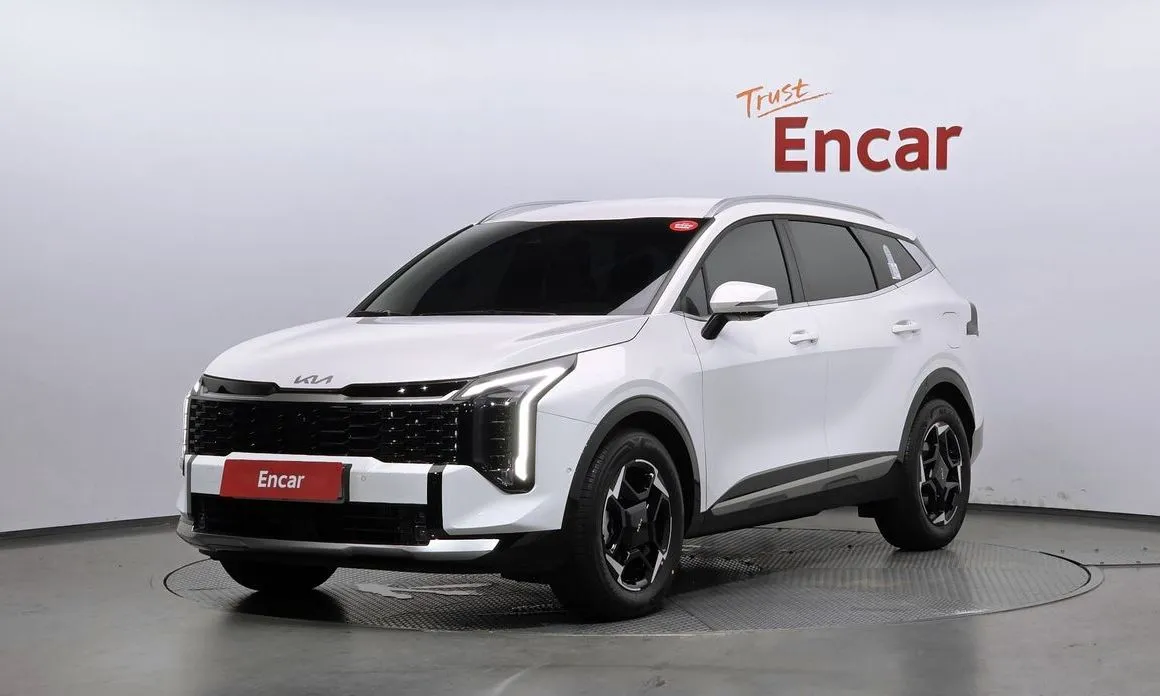 Kia Sportage — фото 1
