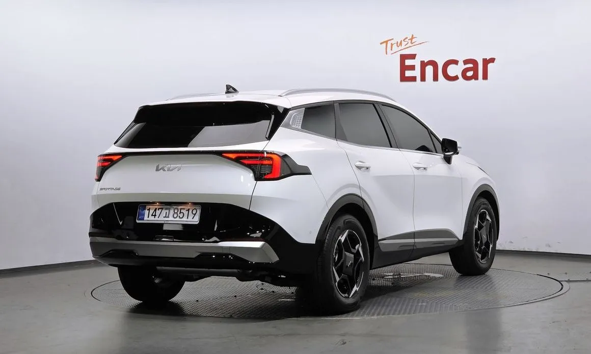 Kia Sportage — фото 9