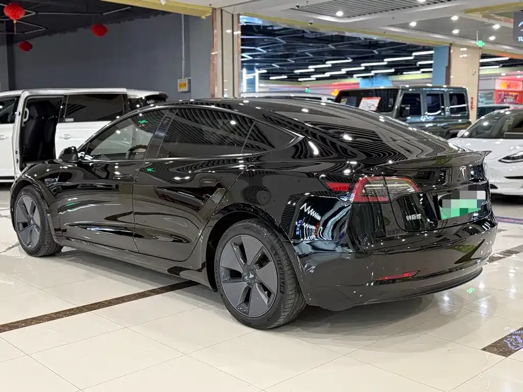 Tesla Model 3 — фото 8