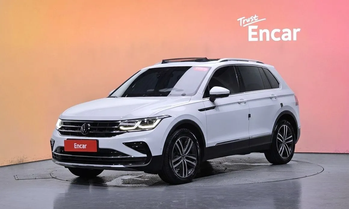 Volkswagen Tiguan — фото 1
