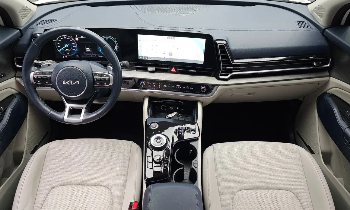 Kia Sportage — фото 10