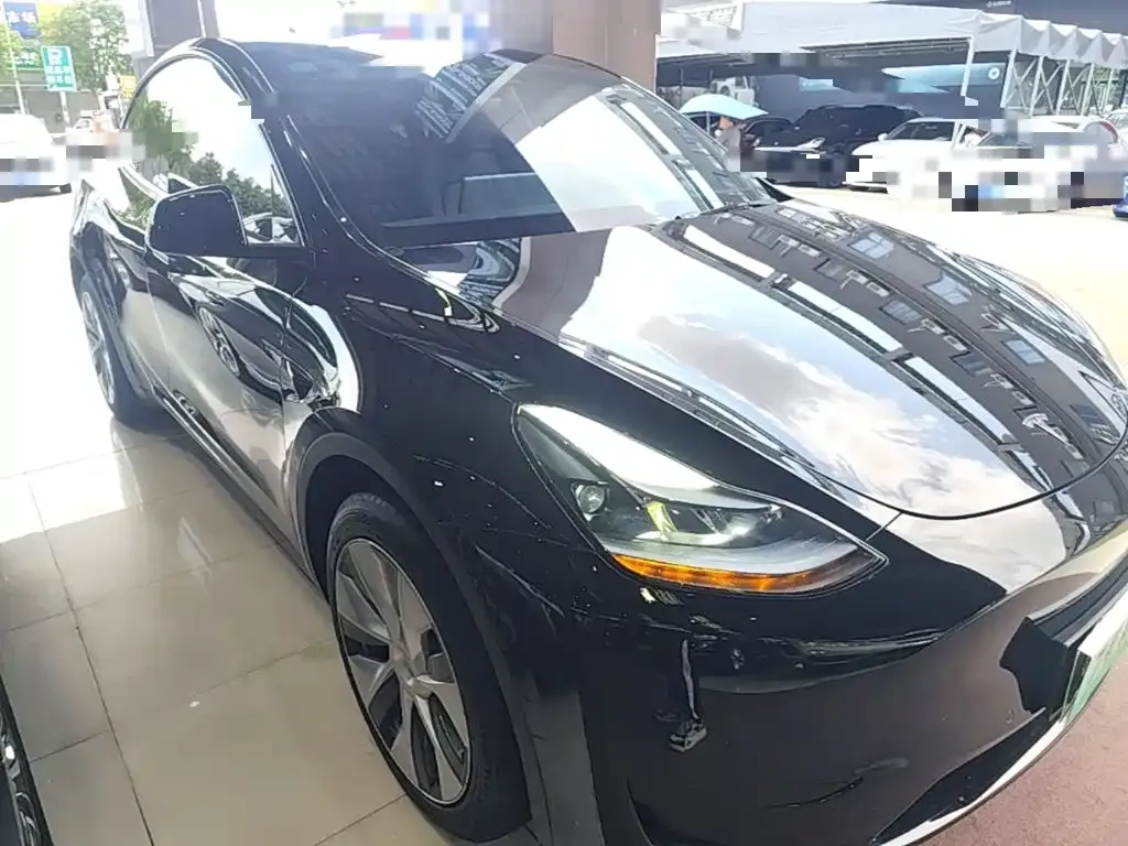 Tesla Model Y — фото 6