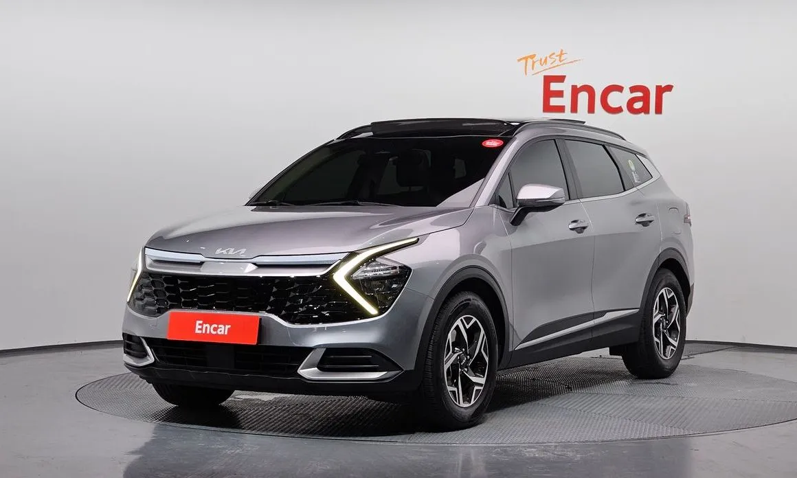 Kia Sportage — фото 1