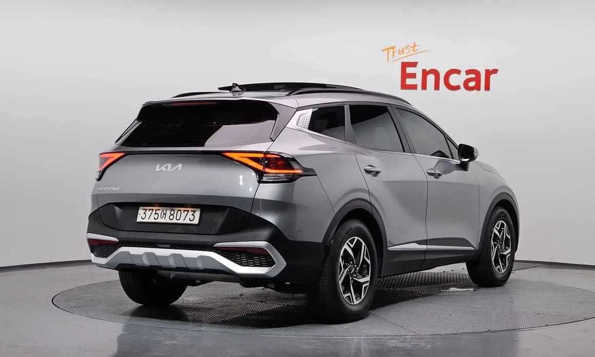 Kia Sportage — фото 10