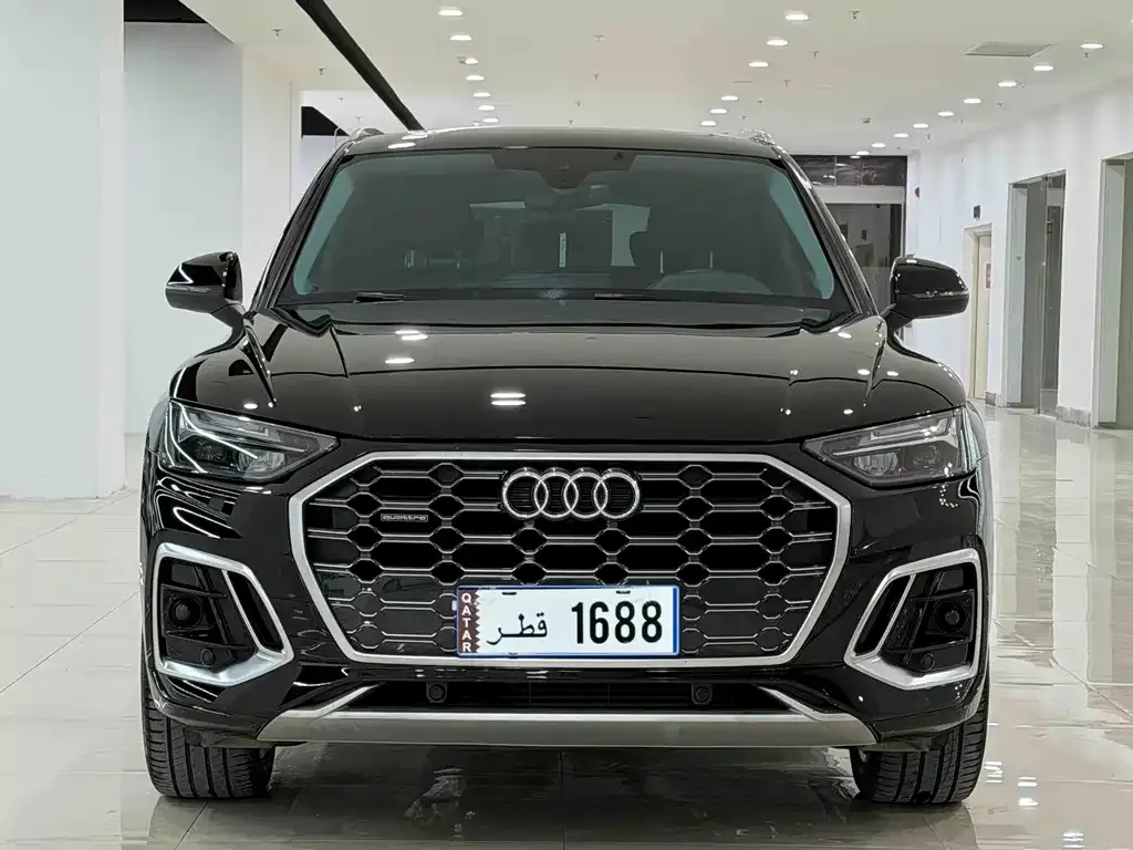 Audi Q5L — фото 6