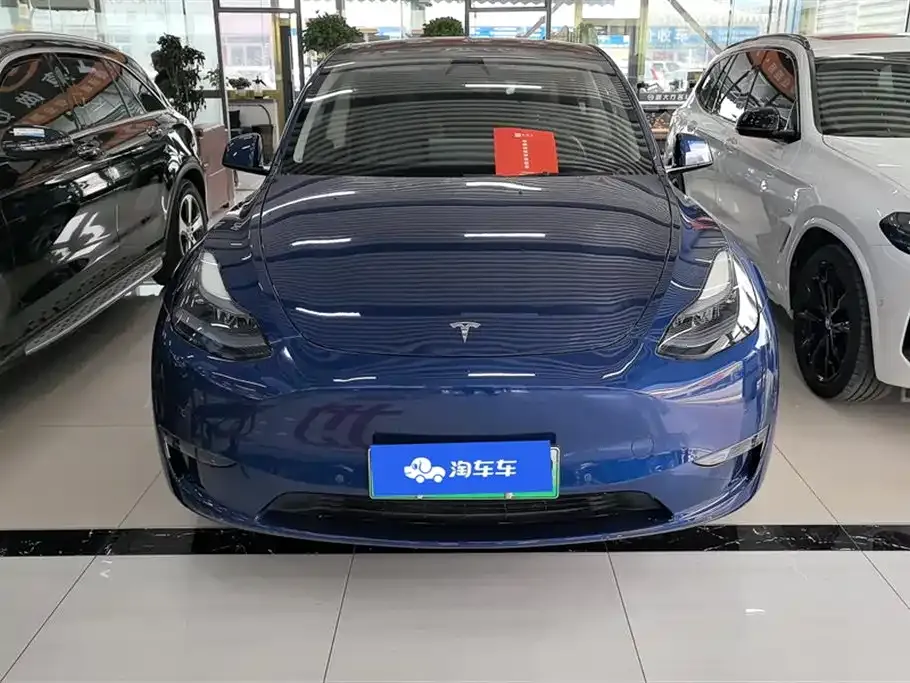 Tesla Model Y — фото 8