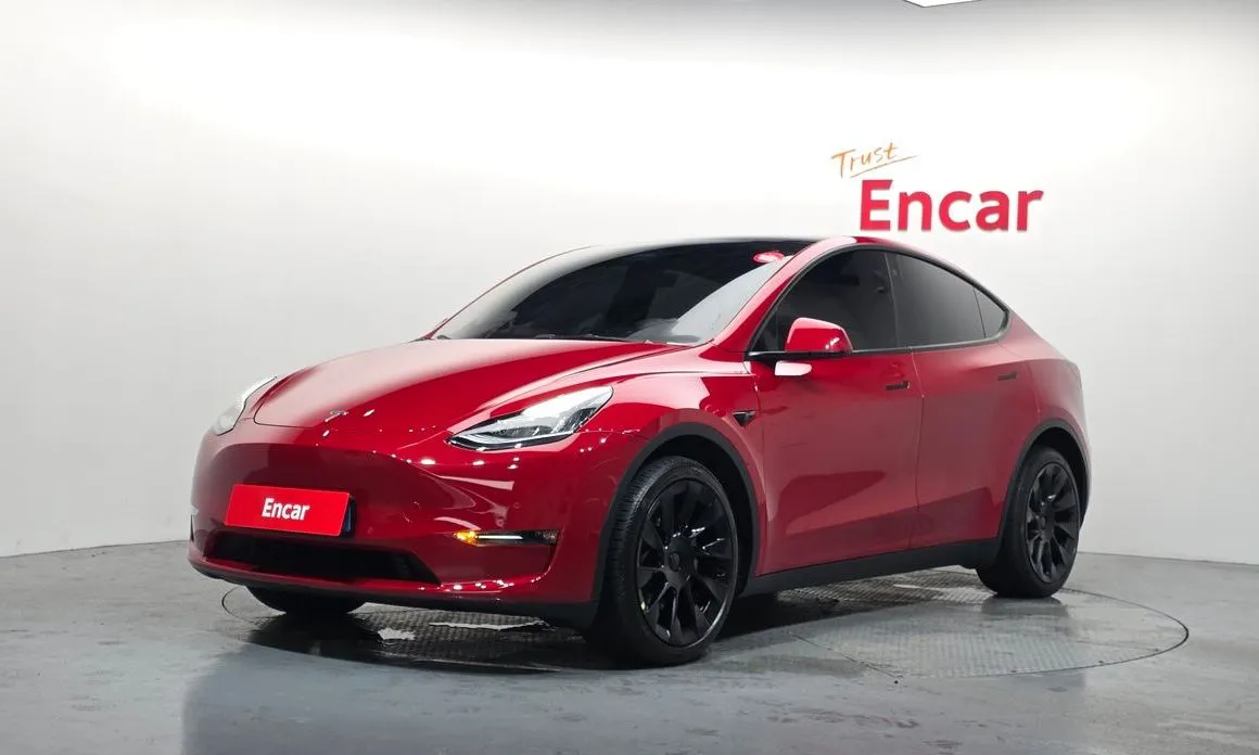 Tesla Model Y — фото 1