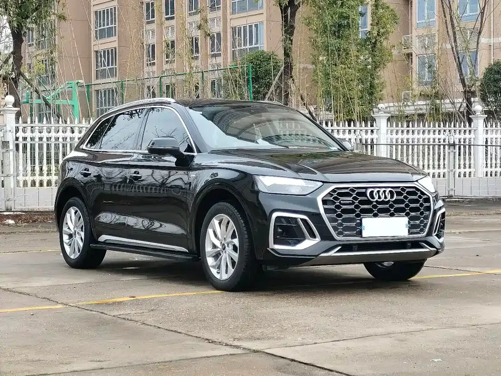 Audi Q5L — фото 10