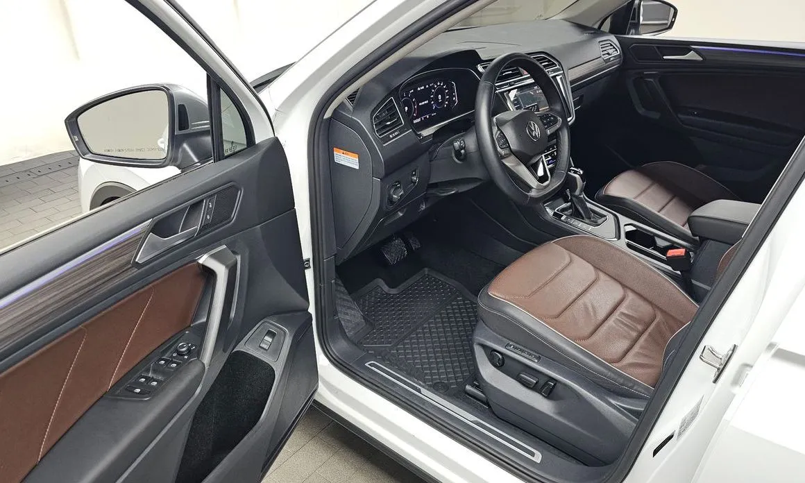 Volkswagen Tiguan — фото 8