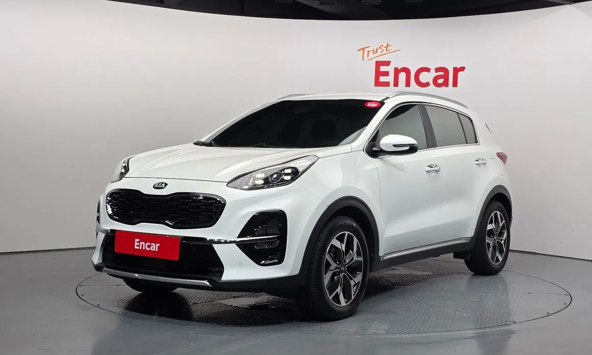Kia Sportage — фото 1