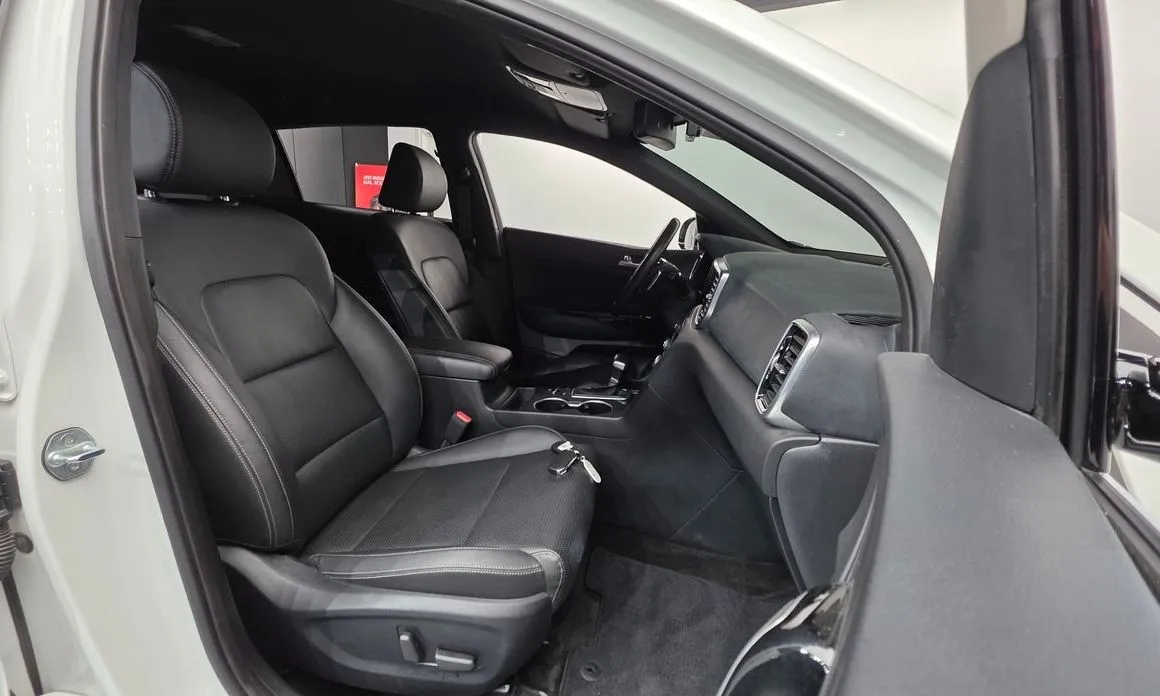 Kia Sportage — фото 8