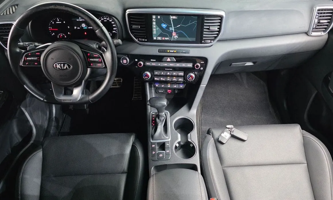 Kia Sportage — фото 9