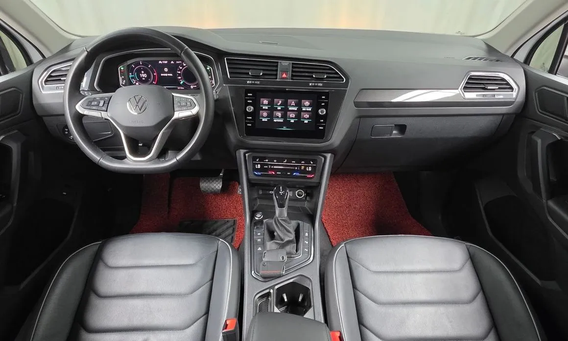 Volkswagen Tiguan — фото 7