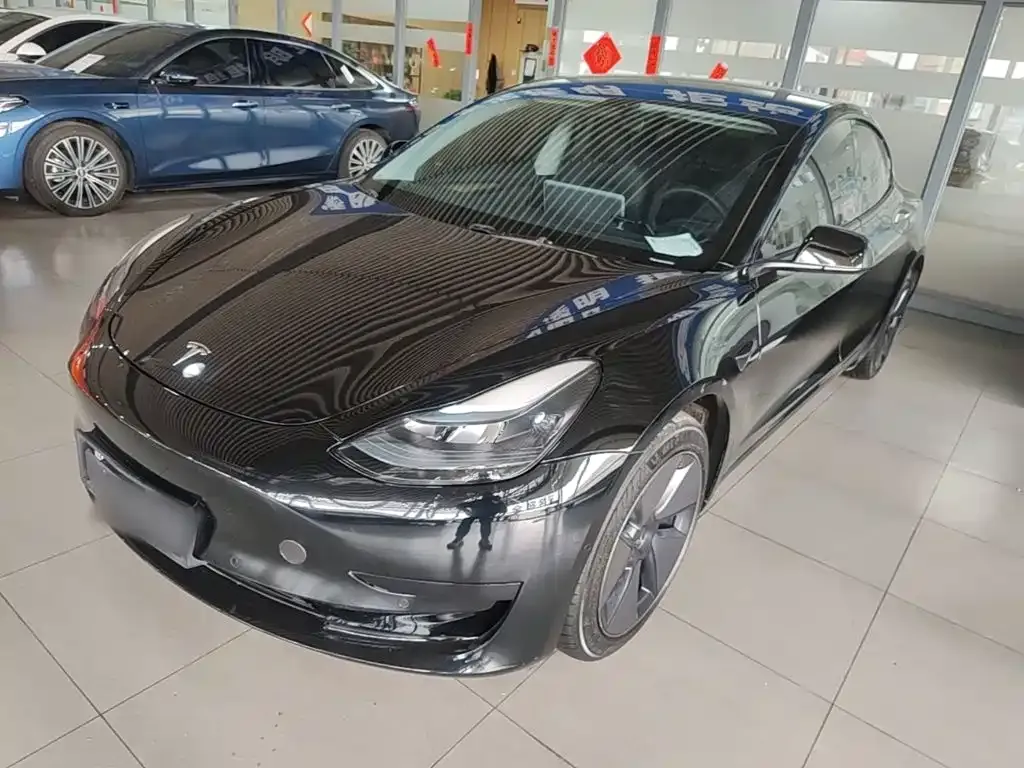 Tesla Model 3 — фото 5