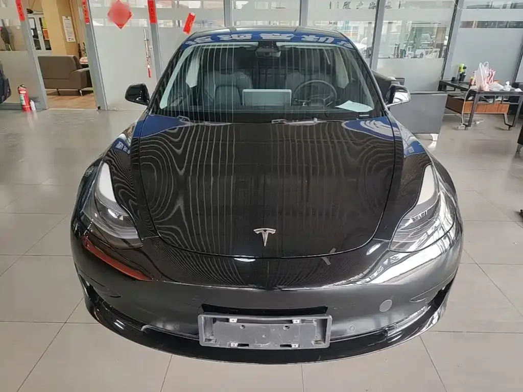 Tesla Model 3 — фото 6