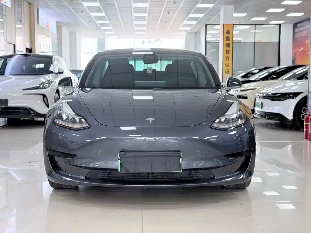Tesla Model 3 — фото 9