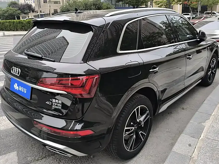 Audi Q5L — фото 9
